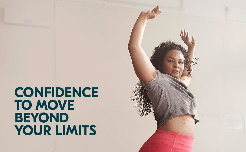 Woman dancing with her hands up